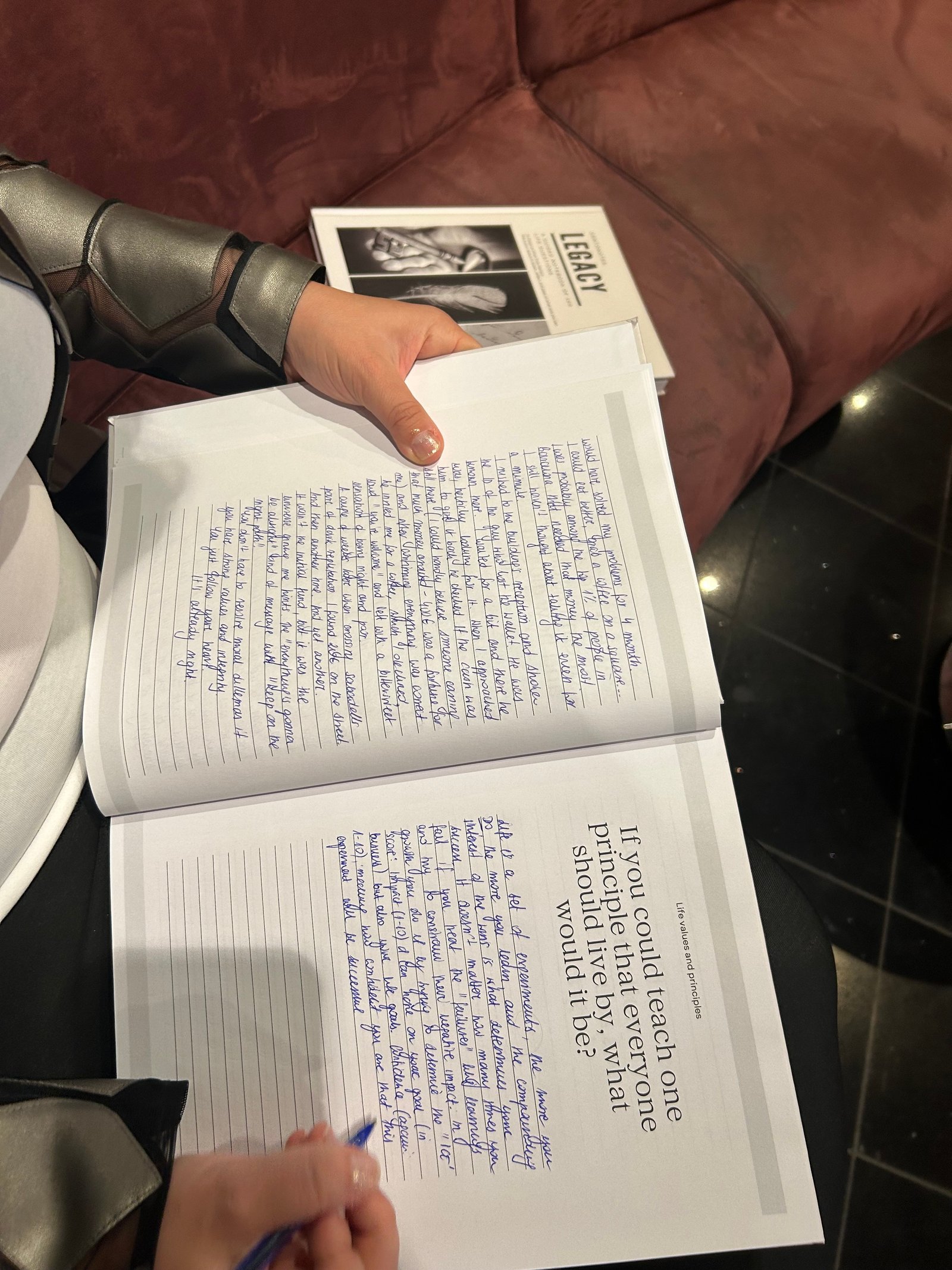 Completed notebook with pages full of writing - Leave Behind